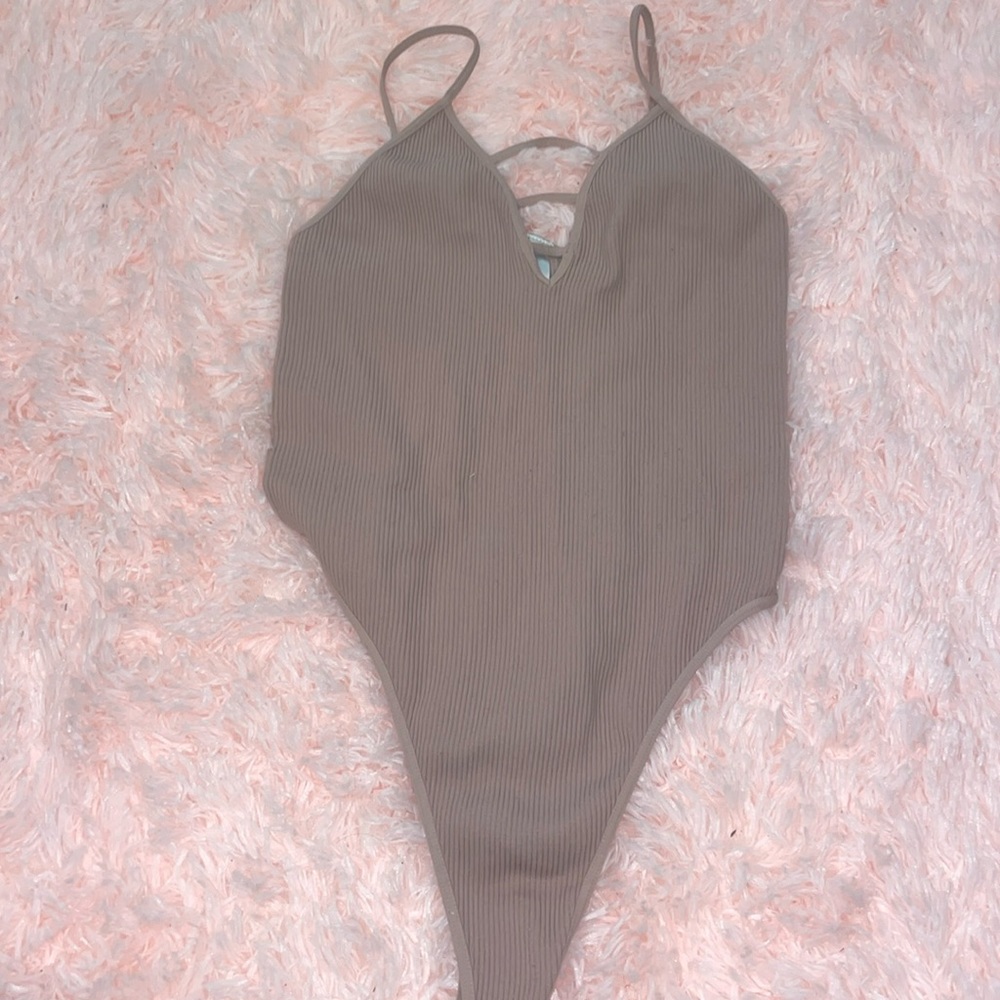 baby pink body suit